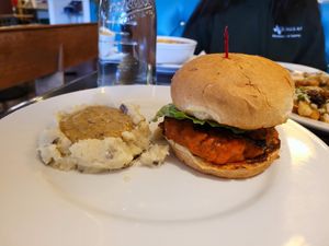 Nashville fried chicken sandwich and mashed potatoes at Tasty Harmony in Fort Collins