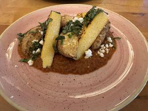 Seasonal Polenta Dish  at Tasty Harmony in Fort Collins