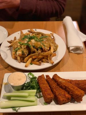Poutine and wings  at Tasty Harmony in Fort Collins