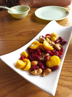 Cold dish with water chestnuts, kidney beans, cashew nuts and chilli. at A Lotus on the Water 清水荷花 - 文殊坊店 in Chengdu