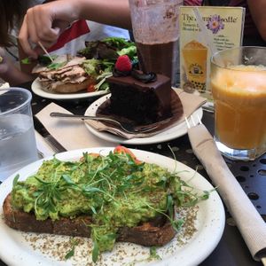 Avocado sandwich and vegan chocolate cake👌🌱 at Urth Caffe in Los Angeles