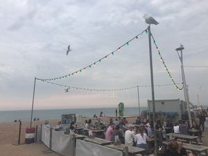 Outdoor area by the sea is the perfect place to sit in summer. at Tempest Inn in Brighton