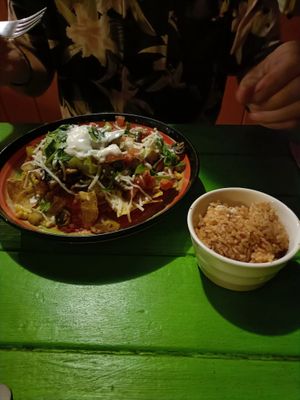 Vegan nachos with Mexican Rice. Good value and yum! at La Casita in Rarotonga