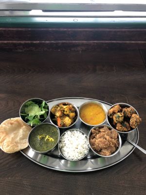 Our Special POP Sunday Buffet:
Rice, 2 veggie dish, puris, dhal soup salad  at Govinda's Dining in Burnaby
