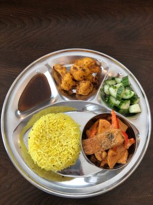 Lemon Rice, Vegan Fish, salad and cauliflower Pakora  at Govinda's Dining in Burnaby