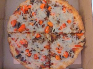 Vegan cheese, mushrooms, peppers at Rollin' Pizza in St Catharines