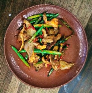 Seared oyster mushrooms with asparagus and harissa at Morito in East London