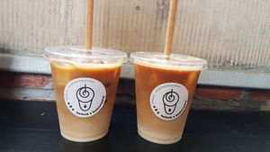 Iced latte with oat milk (take away) at Drukarnia in Gdansk