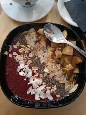 Blueberry smoothie bowl - made vegan by not having the granola at Drukarnia in Gdansk