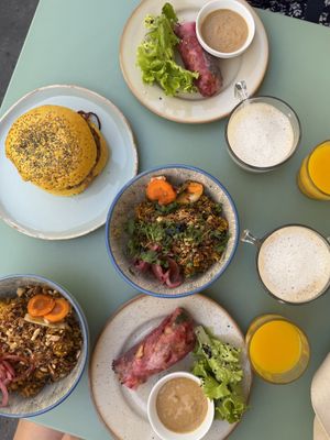 Fresh spring roll with peanut dipping sauce, vegetable fried rice, jack fruit burger, chai latte, fresh pressed ginger and carrot juice   at Monkey Mood in Bordeaux