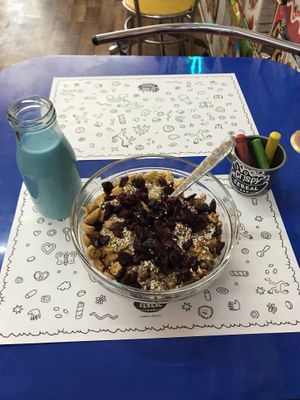 Granola cereals and almond milk at Crispy Cereal Bar in Mexico City