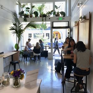 A few small tables inside  at Palm Acai Cafe in Berkeley