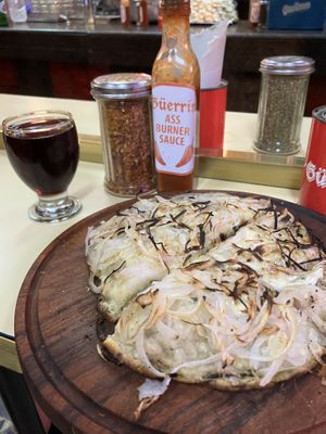 Vegan fugazzetta  at Pizzería Güerrín in Buenos Aires