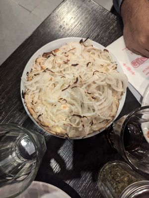 Fugazzeta (pequeña) at Pizzería Güerrín in Buenos Aires