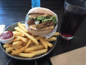 Crumbed mushroom burger with fries  at Moon Under Water in Christchurch