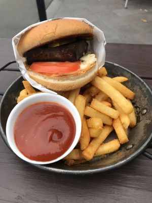 Smoked tofu burger and fries (vegan)  at Moon Under Water in Christchurch