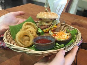 BBQ Bakon burger with onion rings  at Vegan Junkie in Phuket