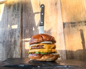 Double Beyond Burger with vegan cheese, homemade vegan house sauces, bun toasted in homemade vegan butter.  at Vegan Junkie in Phuket