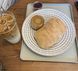Iced soy latte, ciabatta bread with raspberry jam/butter, and cheesecake at For Four Bread 포포브레드 in Seoul