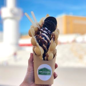 Vegan waffle with caramel ice cream, vegan whipped cream, Oreos, banana, chocolate sauce. at Kuplavohvelibaari in Helsinki