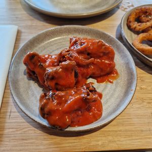 sticky flower wings at Ellis Gourmet Burger in Amsterdam
