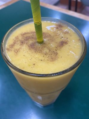 Mango, banana, coconut, cinnamon and nutmeg smoothie custom made  at Snoogies Health Bar in Cairns