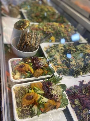 Salad options come in three sizes to dine in or takeaway at Snoogies Health Bar in Cairns