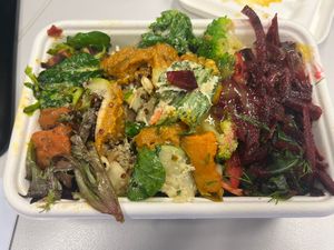 $14 for this loaded takeaway container full of amazing salads. I couldn’t choose so they kindly gave me a taste of everything. Awesome staff!!!  at Snoogies Health Bar in Cairns