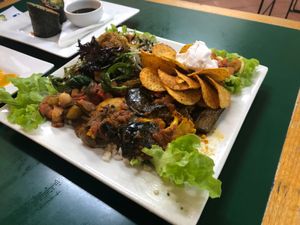 Large vegan mixed plate of curries and salad  at Snoogies Health Bar in Cairns