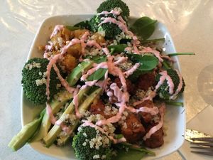 Tempeh salad with avocado and halloumi cheese at VeganE & Saint Vegan in South West London