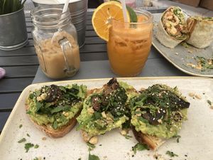 Smashed avo on toast with added mushroom and spinach at Abigail's Cafe in Lagos