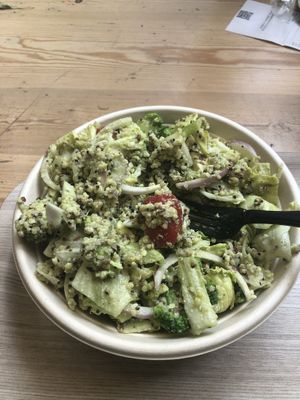 Build your own bowl with iceberg lettuce, quinoa, tomatoes, onions, couscous, broccoli, tofu, avocado, and cashew avocado dressing  at Local Green in Athens