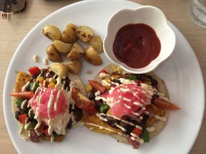 Huevos rancheros y pappas at The Pitted Date in Tulum