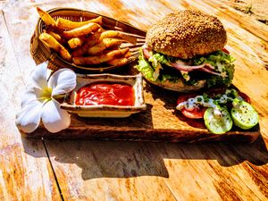 Tempehburger (Pattie made from Tempeh and veggies), with homemade french fries. at FYM in Siem Reap