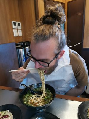 Shovelling and enjoying! at Menbaka Fire Ramen めん馬鹿 in Kyoto