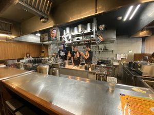 The kitchen at Menbaka Fire Ramen めん馬鹿 in Kyoto