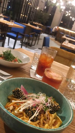 Szechuan udon noodles with tempeh at Spojka Karlin in Prague