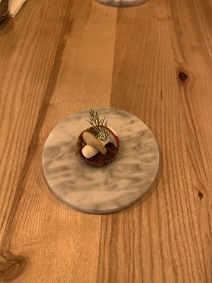 Fun little dinky bread just before the starter! at Mist in Prague