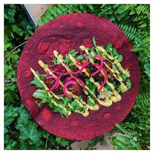 Onion Bhaji Wrap with curry mayo, Pink pickled onions & Mango chutney at Herbivorous in Sheffield