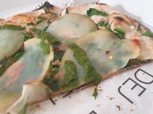 Wilted crust with raw potato slices on top...inedible...all 5 of us were disappointed at DEJ in Copenhagen