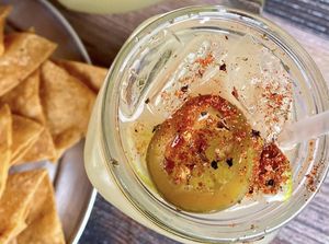 Yummy jalapeño margarita and chips made without parm (their house sour mix is vegan).  at Fire It Up in Naperville