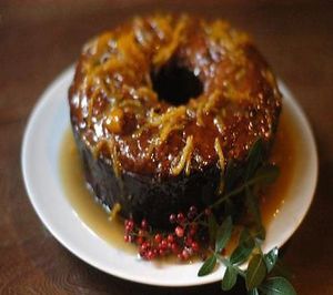 This cake is really special. It was made with tangerines and pink pepper freshly picked on the day from street gardens of Porto Alegre.  at Bonobo in Porto Alegre