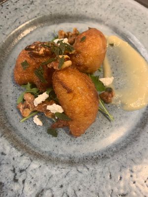 Goats cheese beignets , honey walnuts , pear purée and crisp sage  at The Selkirk Arms in Kirkcudbright