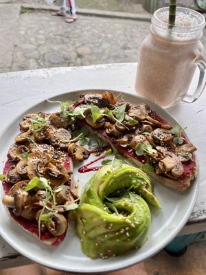 Mushroom toast and aloha smoothie  at Coco Bowl in Salento