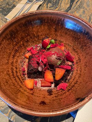 This vegan brownie with chocolate sorbet and peach slices was very delish ✨  at Amano in Auckland