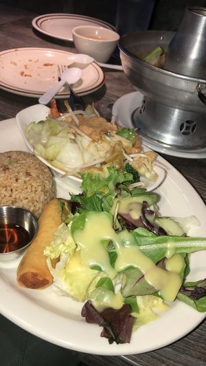 Dinner or lunch menu “ mixed vegetables “ in the back a “tom yum vegetables “ at Bright Star in Rancho Cucamonga