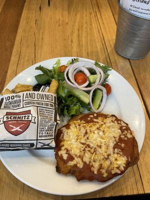 Parmi, chips and garden salad   at Schnitz in Cairns