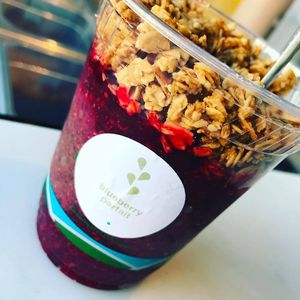 Blueberry Parfait: Almond milk, Chia seeds, orange, cinnamon, vanilla extract, maple syrup served with granola  a nutty mix at Greensurge in San Francisco