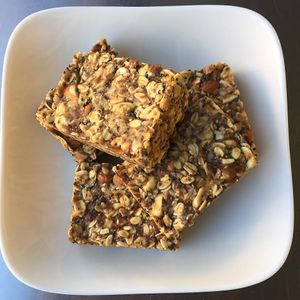 Nutty Protein Bars: almond, cashew, flax seed, rolled oats, chia seeds, coconut, peanut butter, dates, honey at Greensurge in San Francisco