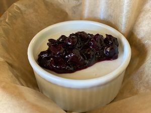 Tembleque, a Puerto Rican style coconut custard made w/ organic coconut milk & cane sugar topped w/ organic blueberry compote.  Vegan & GF at Maize & Barley in Edmonds